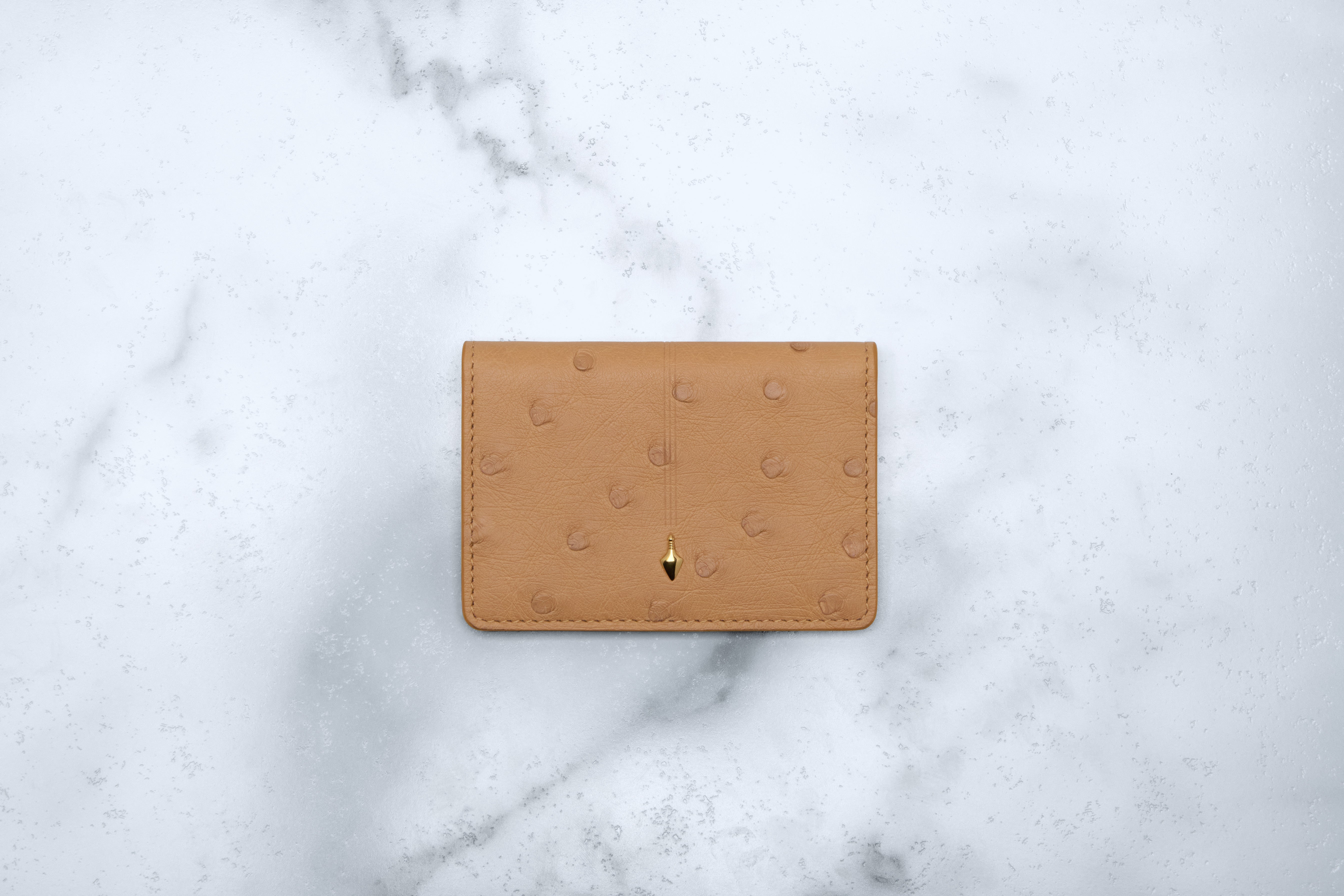 Jacques Marie Mage Cassandre portafoglio bifold Bordeaux Ostrich