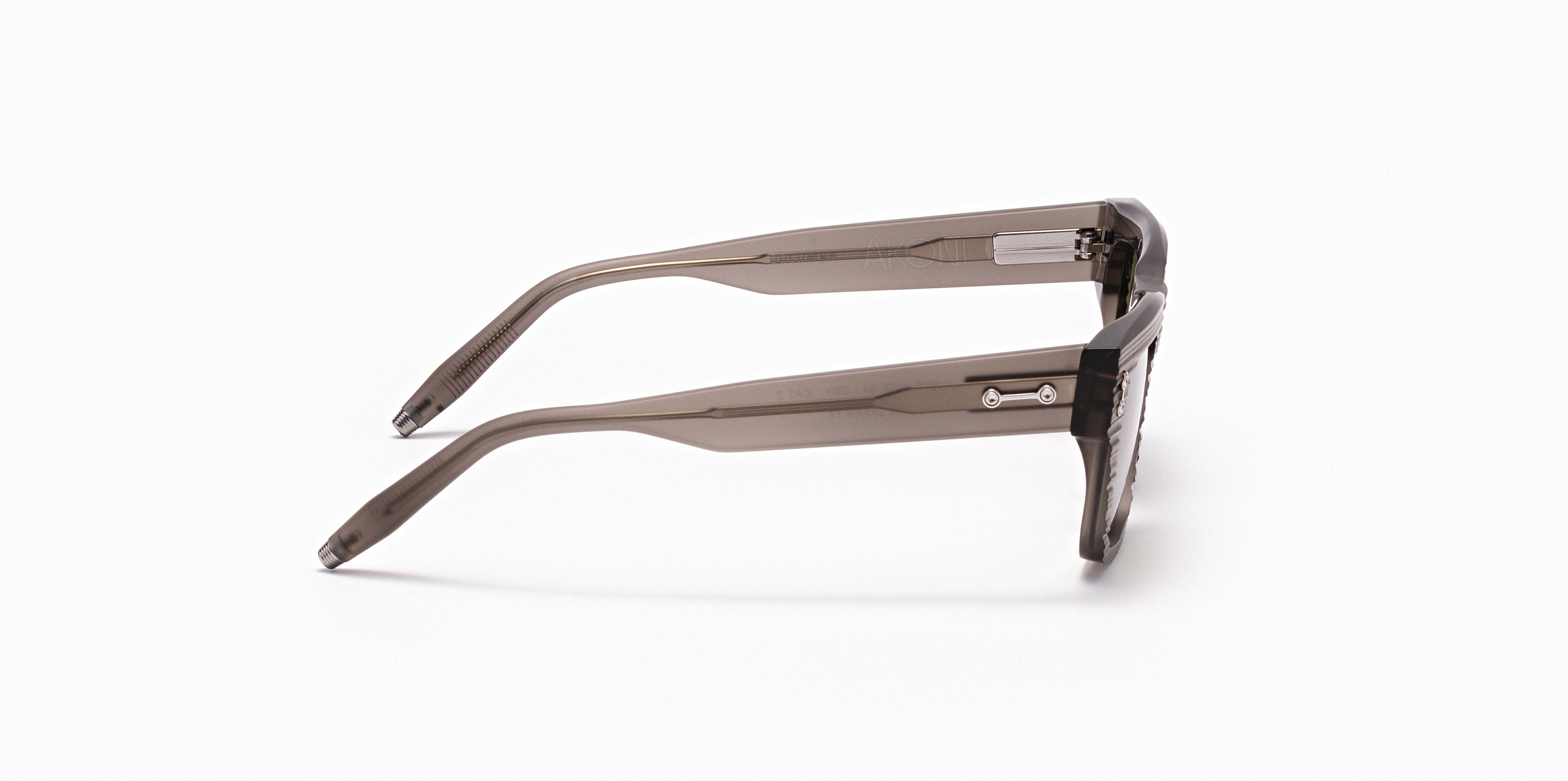 Akoni Etere Columba 54 occhiali da sole grigio acetato