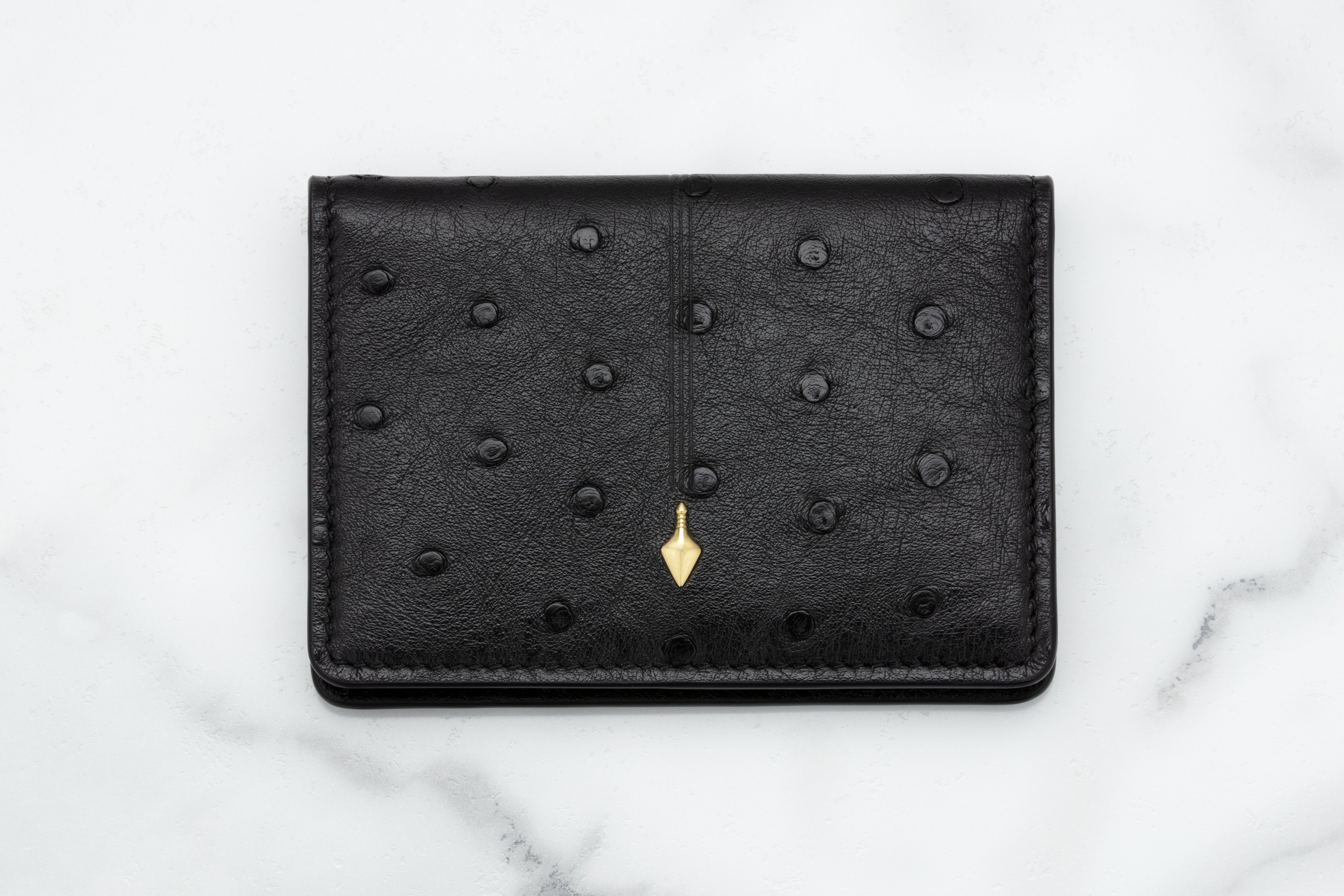 Jacques Marie Mage Cassandre portafoglio bifold Bordeaux Ostrich