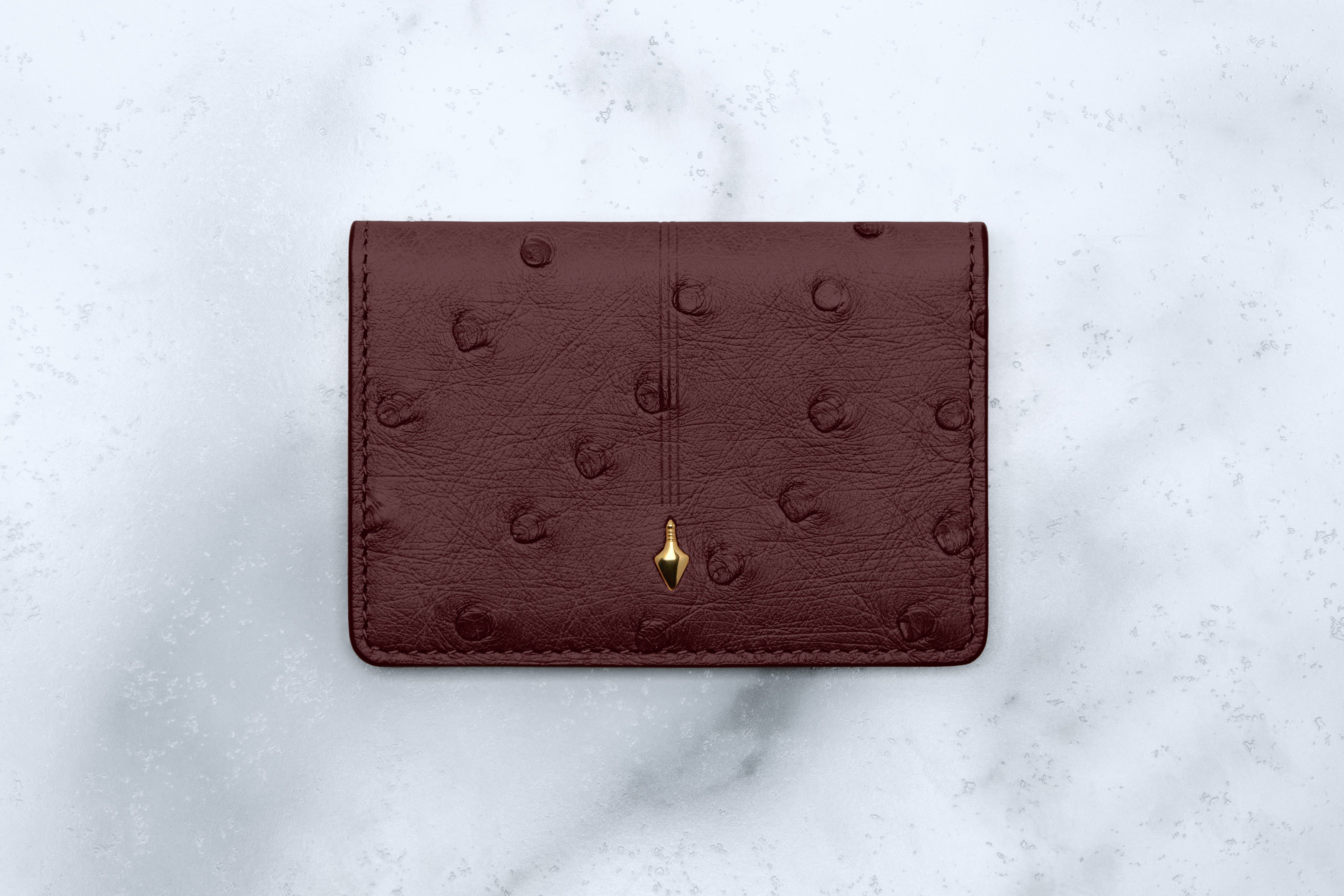 Jacques Marie Mage Cassandre portafoglio bifold Bordeaux Ostrich