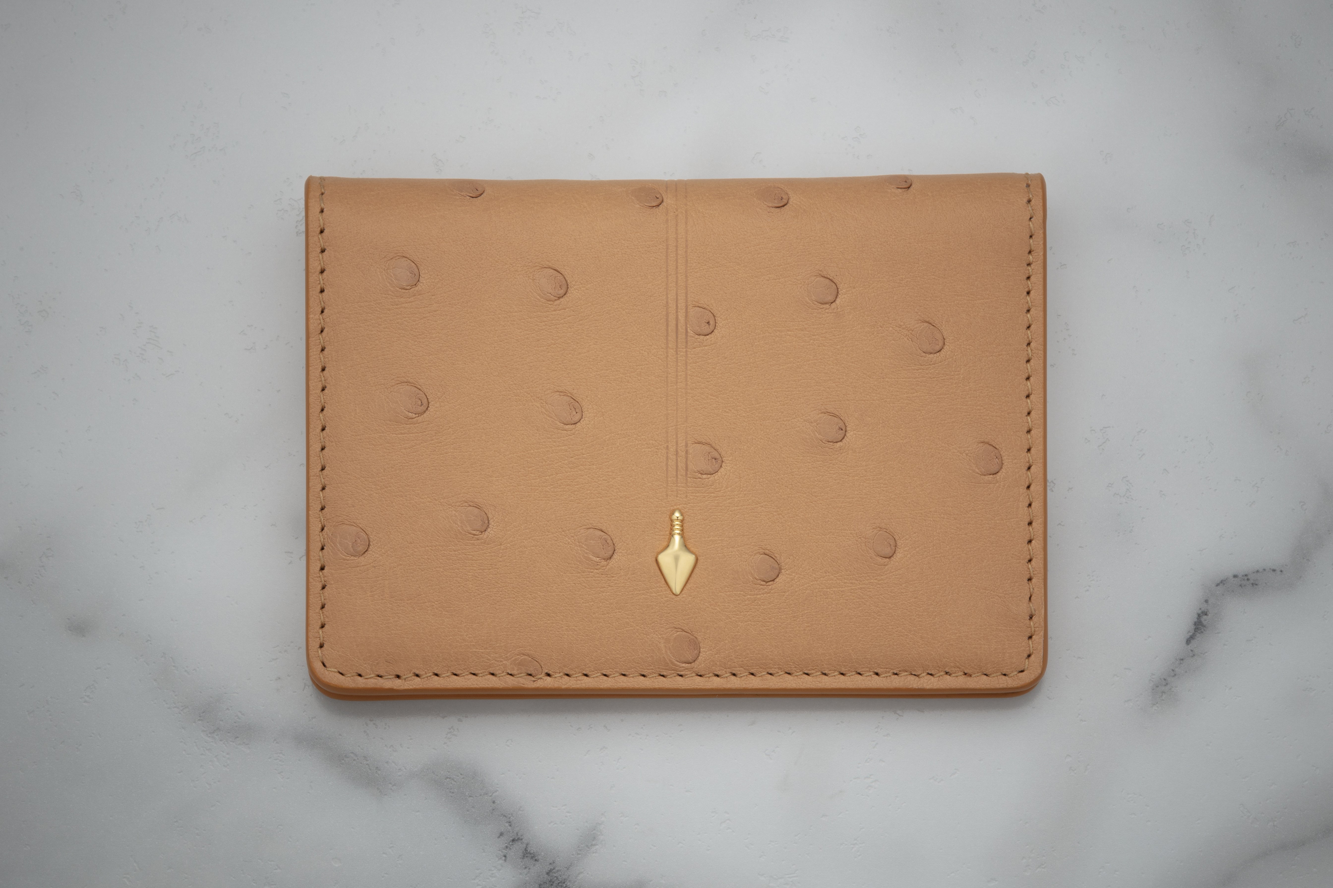 Jacques Marie Mage Cassandre portafoglio bifold Bordeaux Ostrich